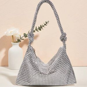 I have a silver sparkly purse for sale